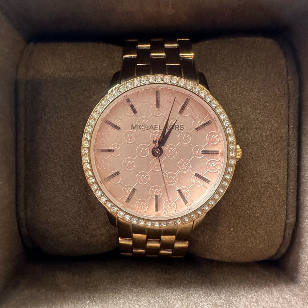 Michael Kors rose gold with pink face